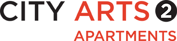 A sign that says City Arts Apartments.
